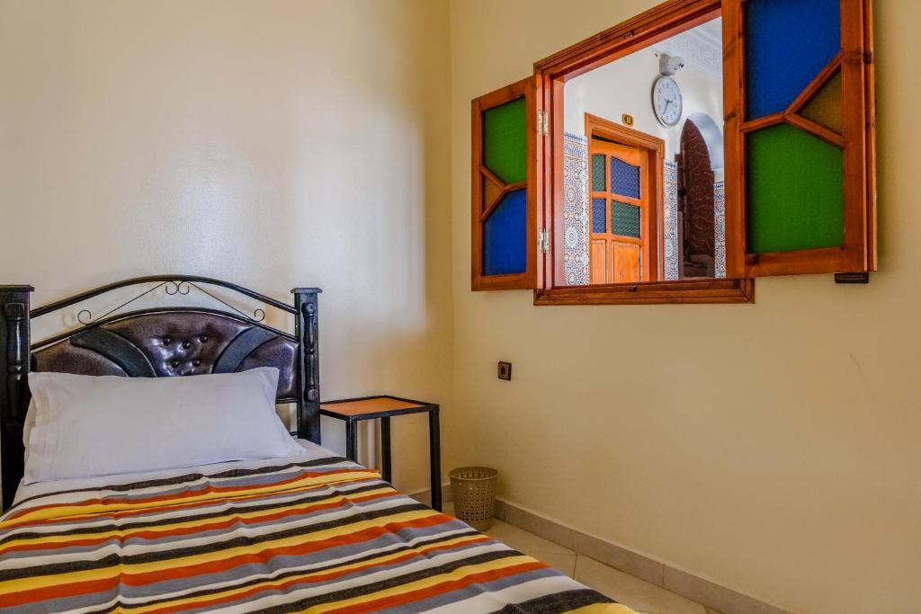 Voodi või voodid majutusasutuse Yakout hostel toas