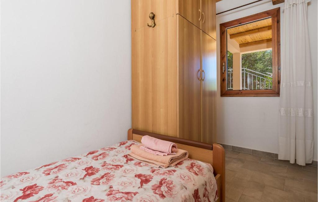 Posteľ alebo postele v izbe v ubytovaní Lovely Home In Josinovac With Wifi