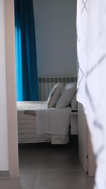 Postel nebo postele na pokoji v ubytování Biscotti s room