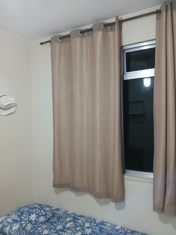Postel nebo postele na pokoji v ubytování Quarto Privado Cama Casal ou Solteiros Apto