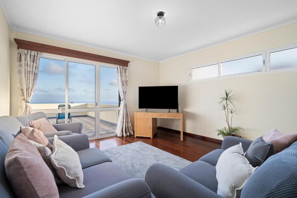 TV a/nebo společenská místnost v ubytování Casa Carlota by Atlântica