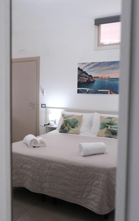 Postel nebo postele na pokoji v ubytování Biscotti s room