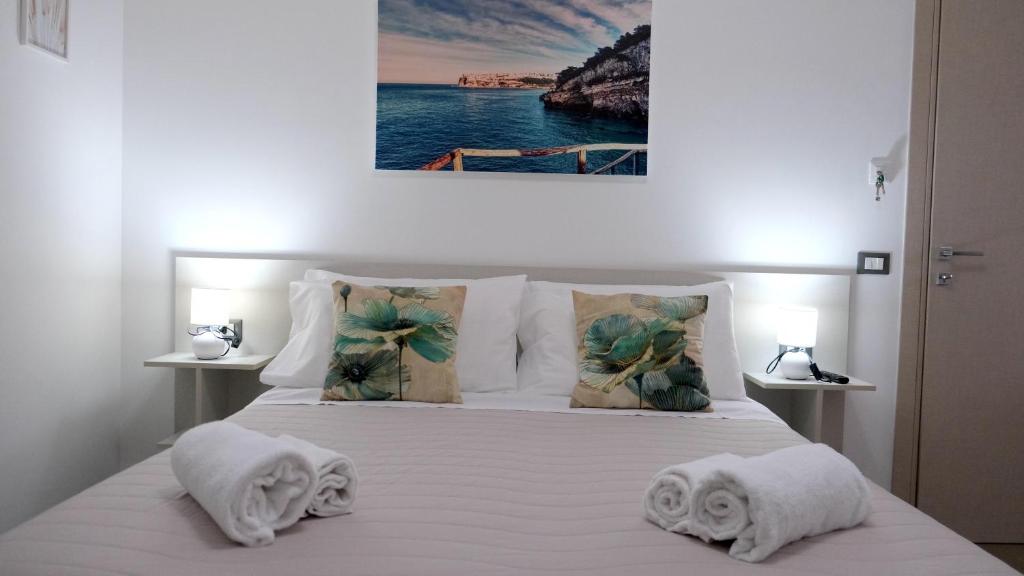 Postel nebo postele na pokoji v ubytování Biscotti s room