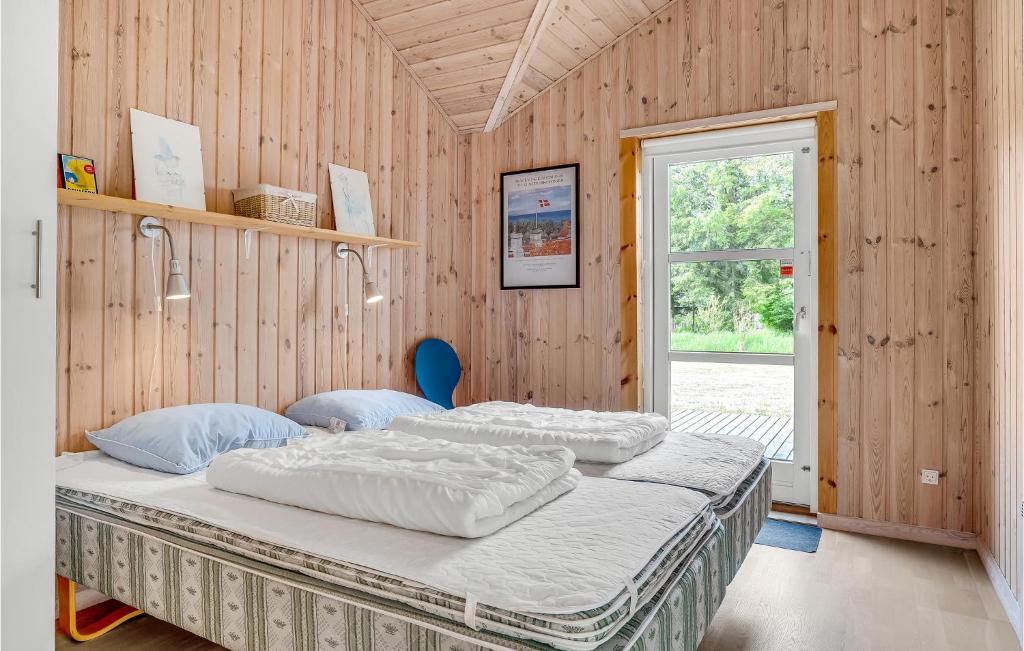 Postel nebo postele na pokoji v ubytování Holiday Home Kuskevej Jerup Ix