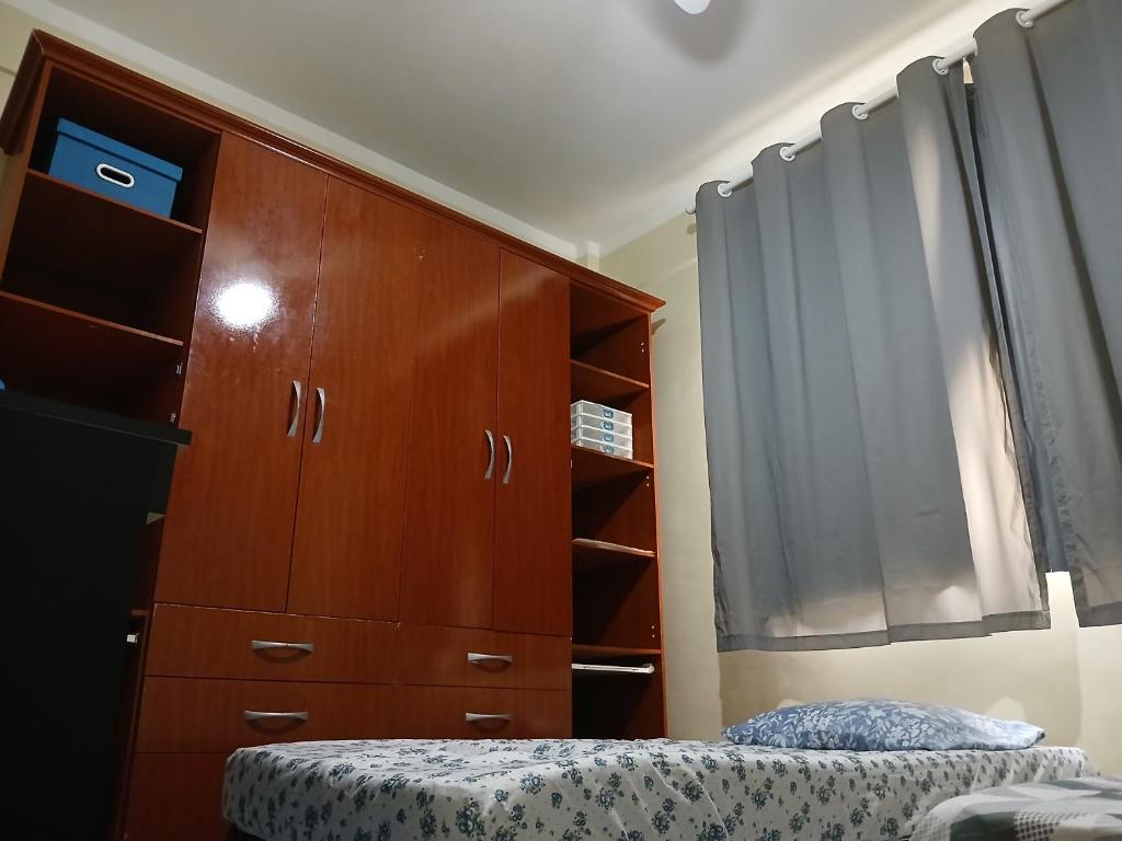 Postel nebo postele na pokoji v ubytování Quarto Privado Cama Casal ou Solteiros Apto