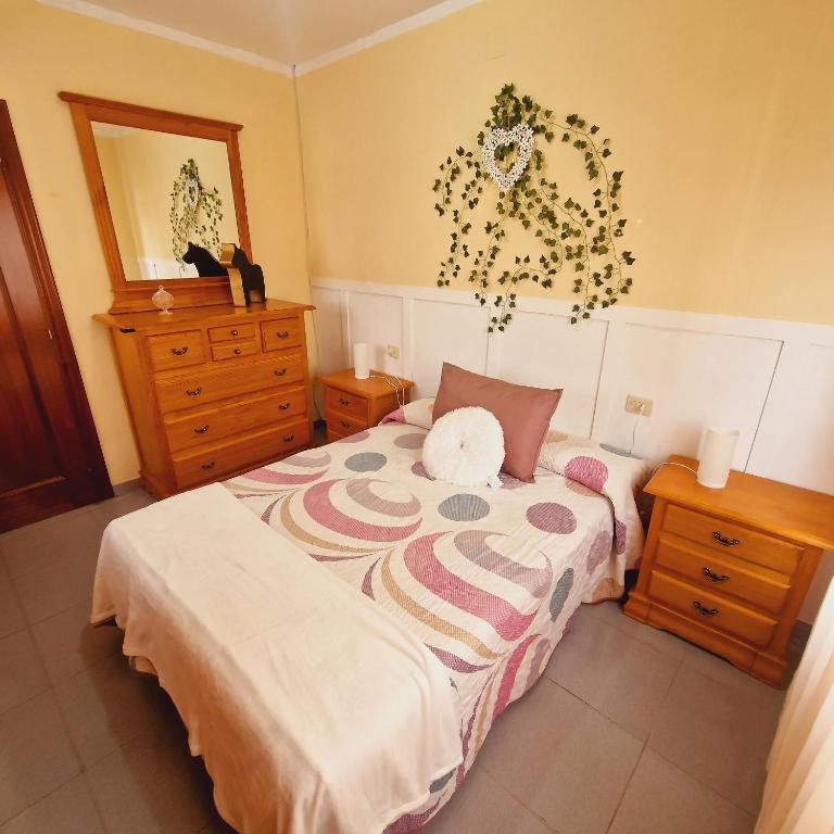 Postel nebo postele na pokoji v ubytování Chalet Playa Chilches