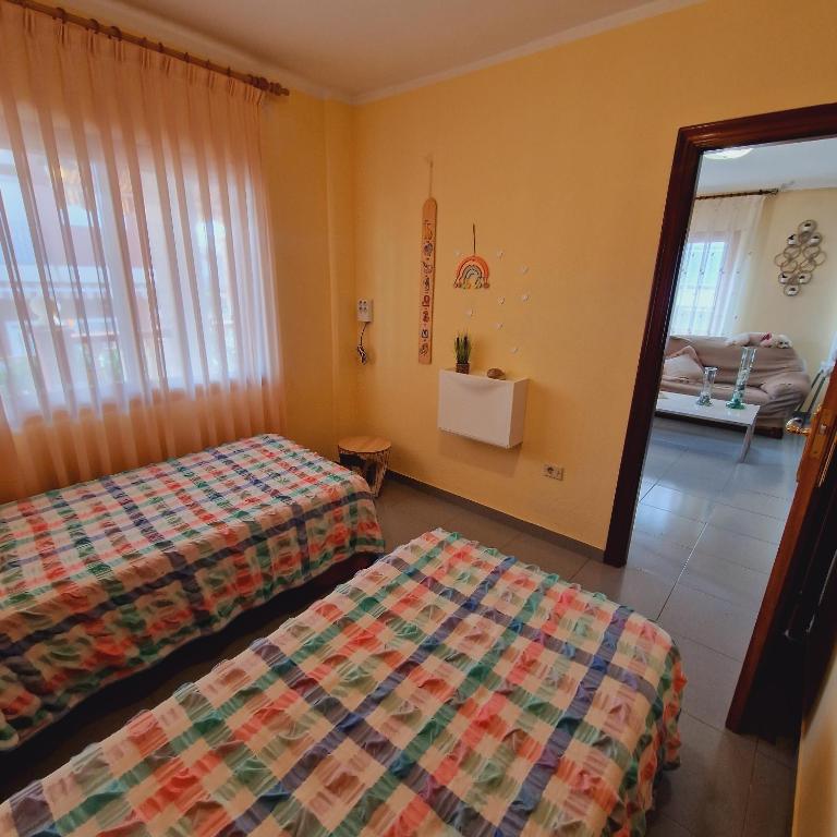 Postel nebo postele na pokoji v ubytování Chalet Playa Chilches