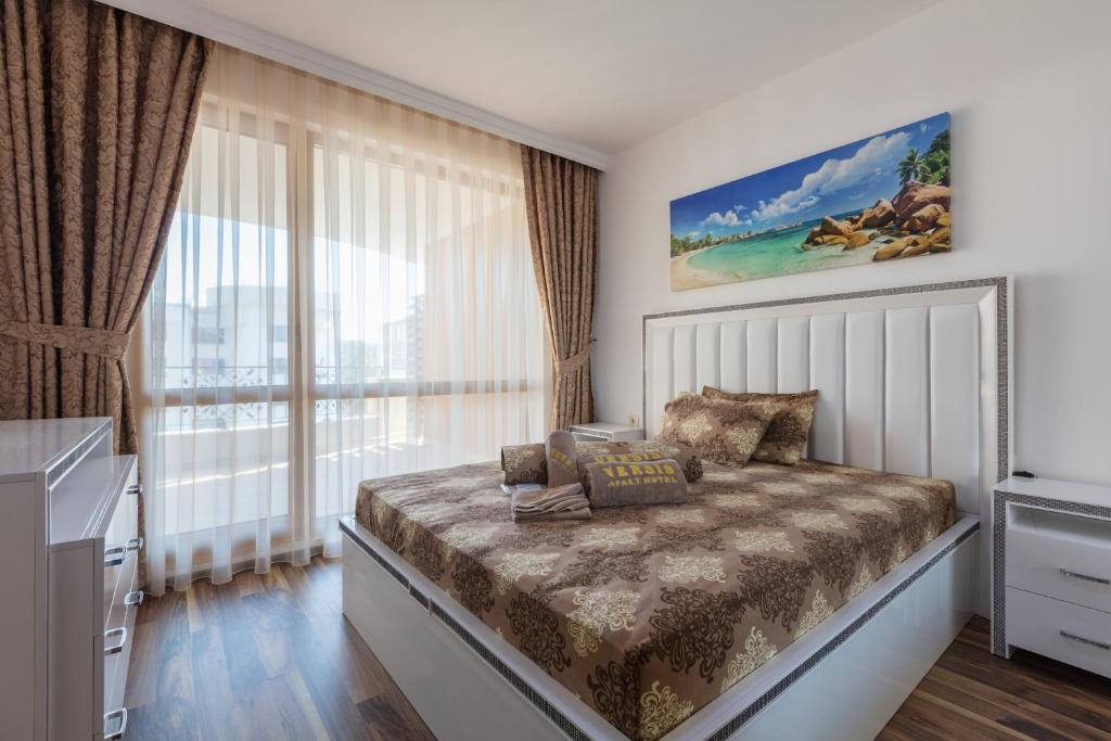 Postel nebo postele na pokoji v ubytování Boutique Apart Hotel Versis