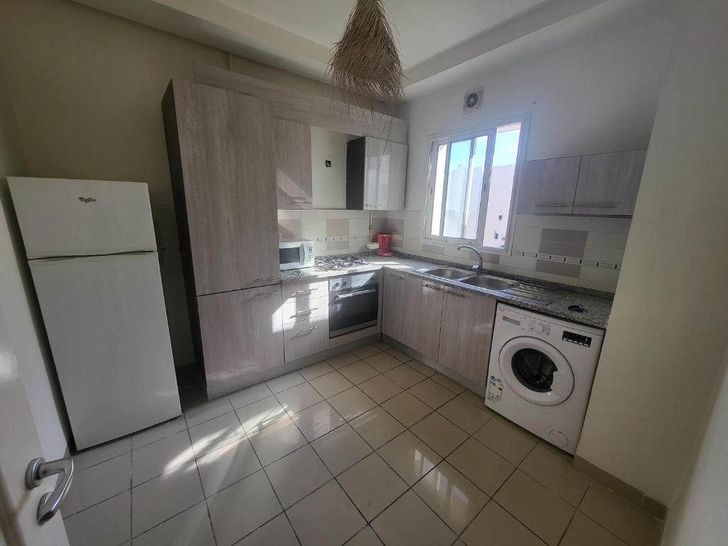 Kuchyň nebo kuchyňský kout v ubytování Appartement top capi