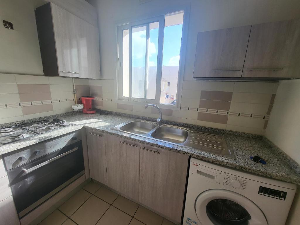 Kuchyň nebo kuchyňský kout v ubytování Appartement top capi