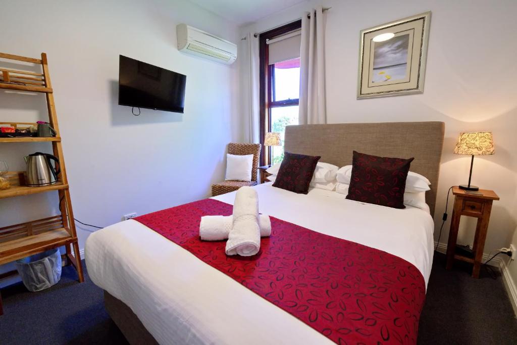 Postel nebo postele na pokoji v ubytování Tranquilles Bed & Breakfast