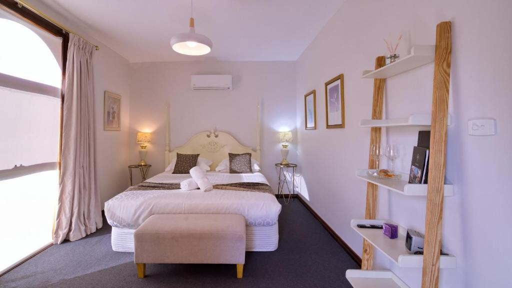 Postel nebo postele na pokoji v ubytování Tranquilles Bed & Breakfast