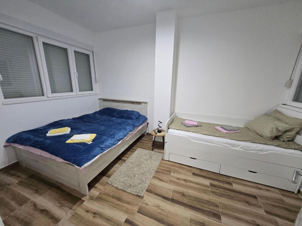 Voodi või voodid majutusasutuse Apartman Divcibare Bela NS 56m2 Lux toas