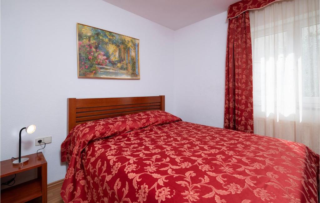 Posteľ alebo postele v izbe v ubytovaní Cozy Apartment In Pula With Wifi