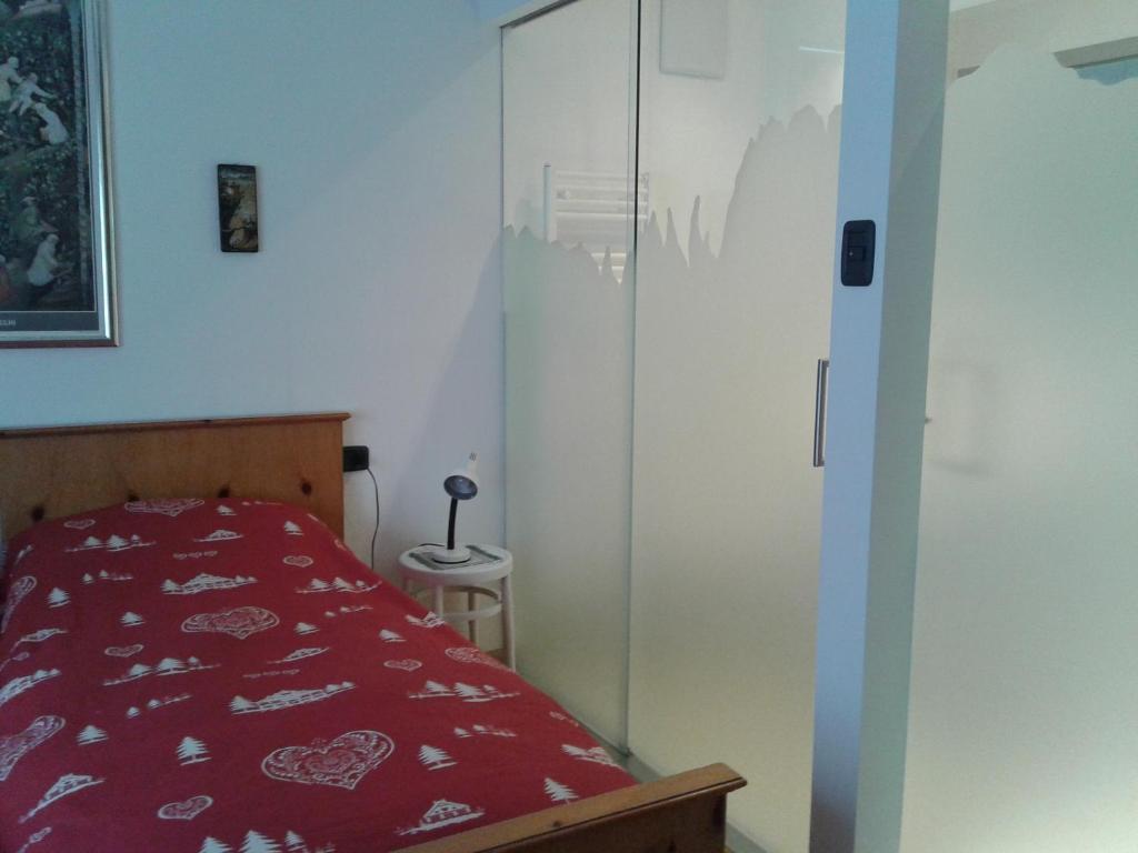 Postel nebo postele na pokoji v ubytování Condominio Zorzi
