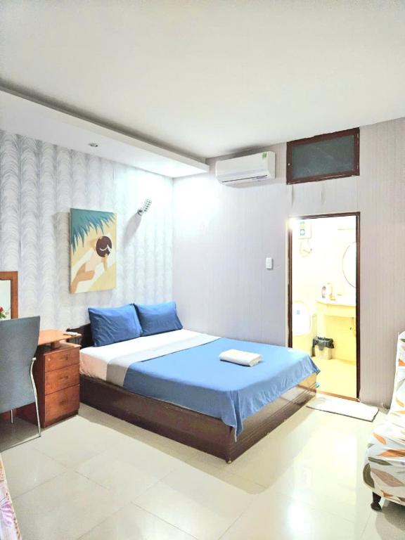 Giường trong phòng chung tại Anna Luxury Apartment