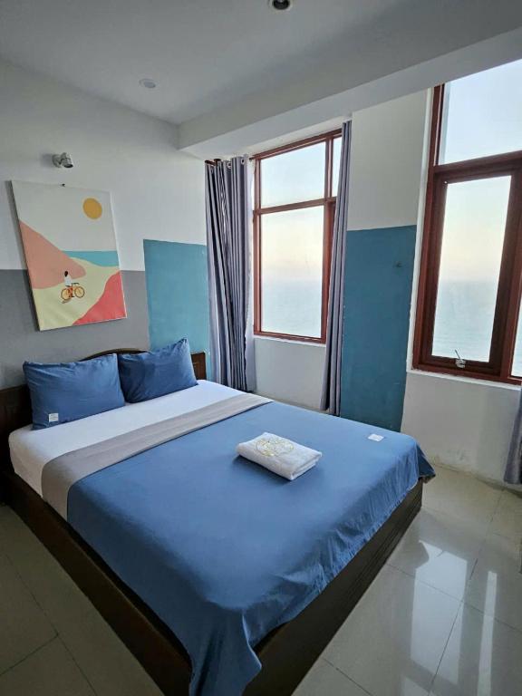 Giường trong phòng chung tại Anna Luxury Apartment