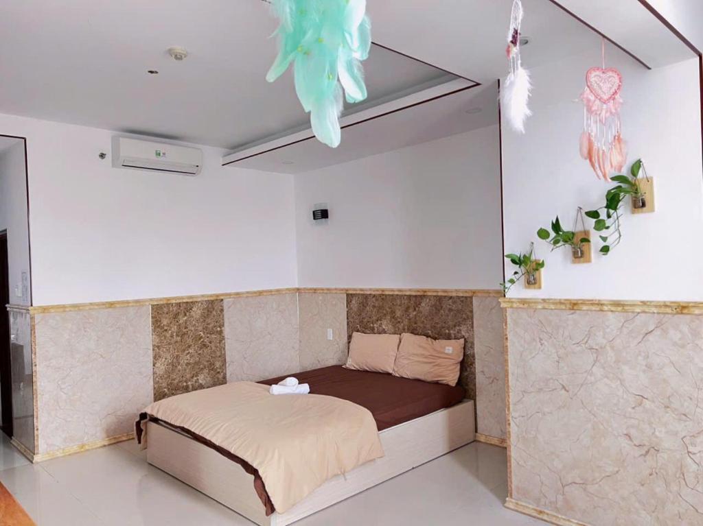 Giường trong phòng chung tại Anna Luxury Apartment