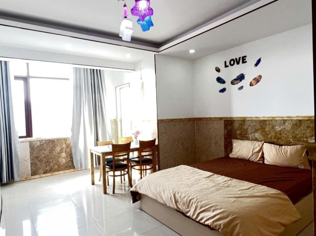 Giường trong phòng chung tại Anna Luxury Apartment