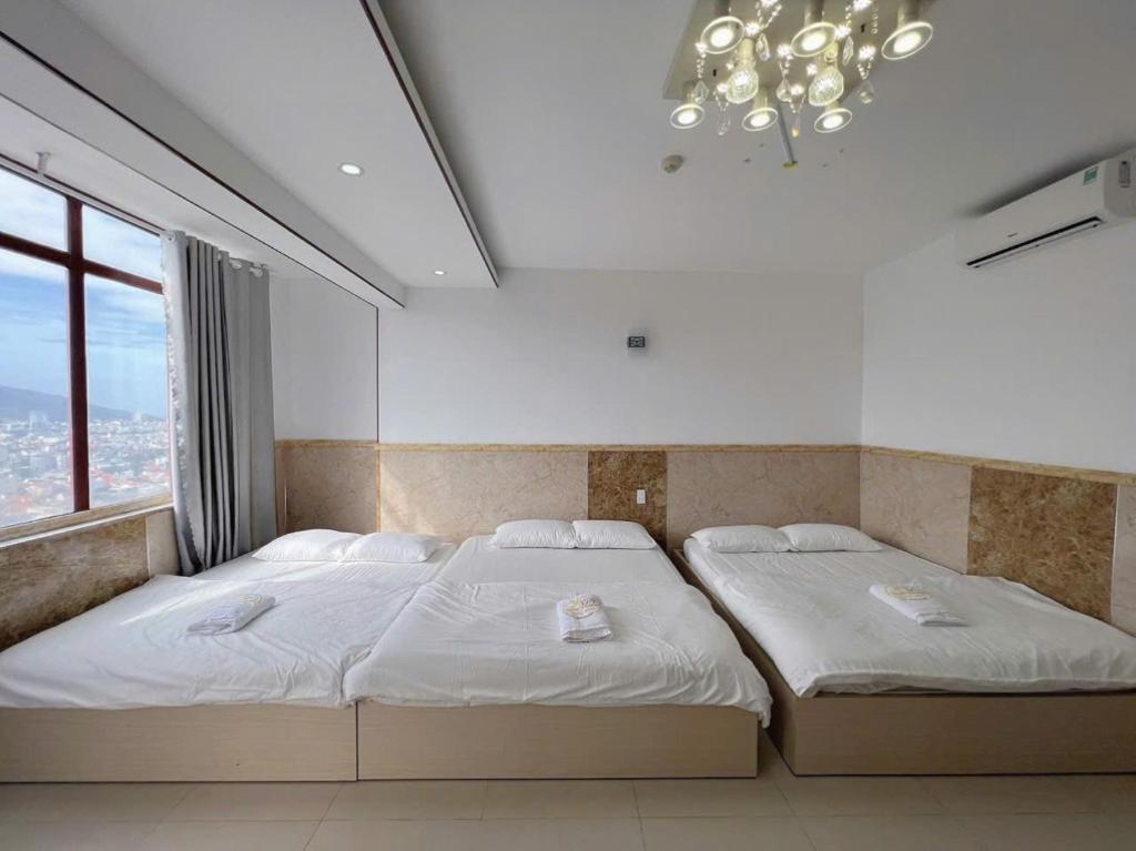 Postel nebo postele na pokoji v ubytování Thúy Hạnh Homestay