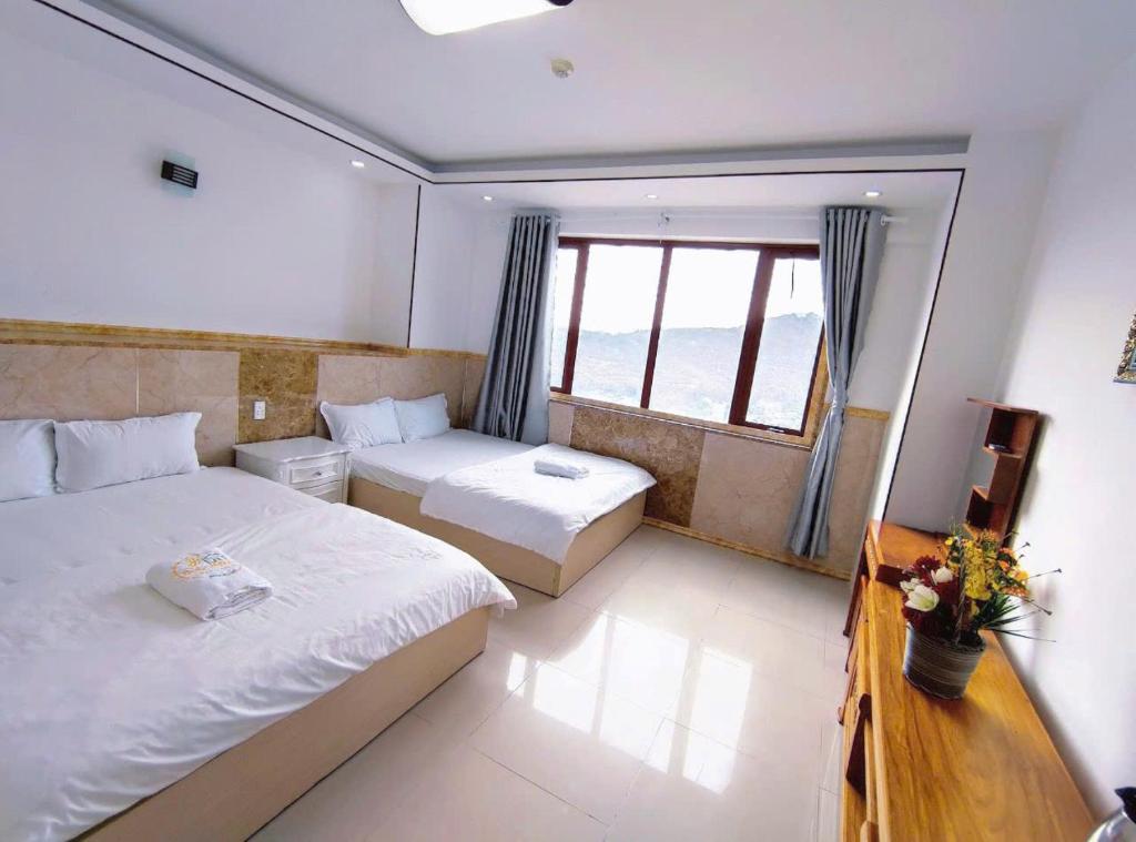 Postel nebo postele na pokoji v ubytování Thúy Hạnh Homestay