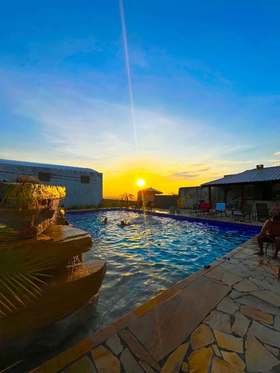 A piscina localizada em Pousada Serra de São Thomé ou nos arredores