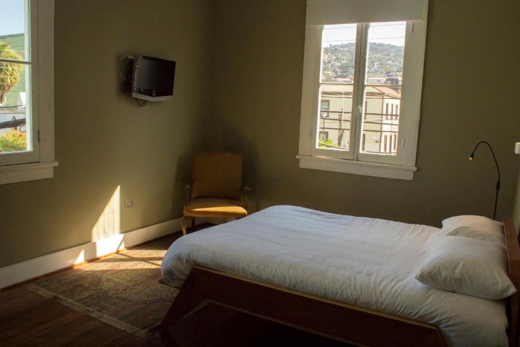 Postel nebo postele na pokoji v ubytování El Navegante B&B