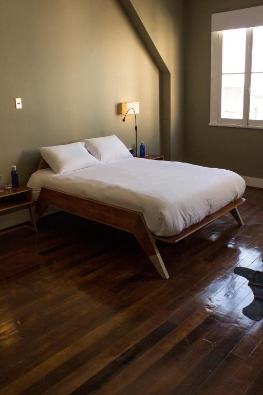 Postel nebo postele na pokoji v ubytování El Navegante B&B