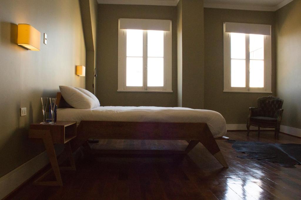 Postel nebo postele na pokoji v ubytování El Navegante B&B