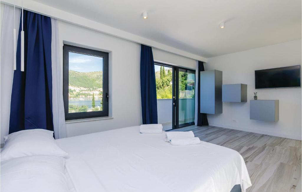 Posteľ alebo postele v izbe v ubytovaní Four-Bedroom Holiday Home In Zaton Mali