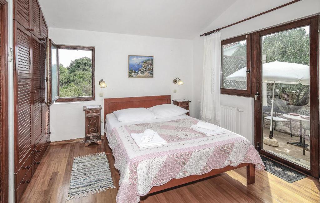 Postel nebo postele na pokoji v ubytování Holiday Home Vela Rina Iv