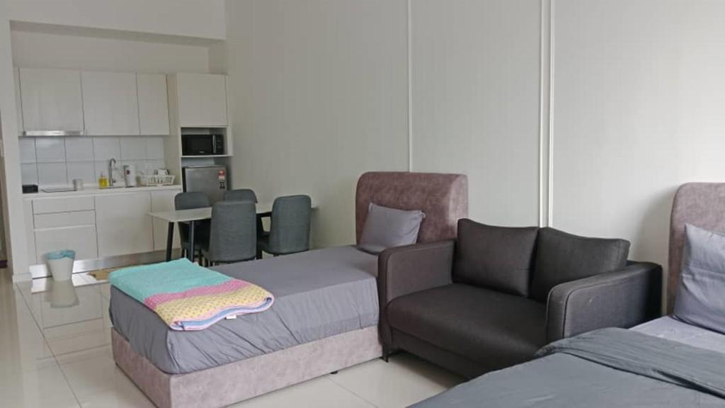Posezení v ubytování Chambers Residence by Gloria Homes