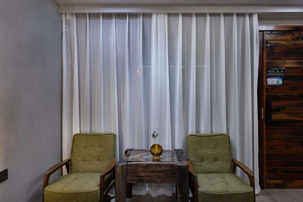 Uma área de estar em Xitang Overnight Garden B&B