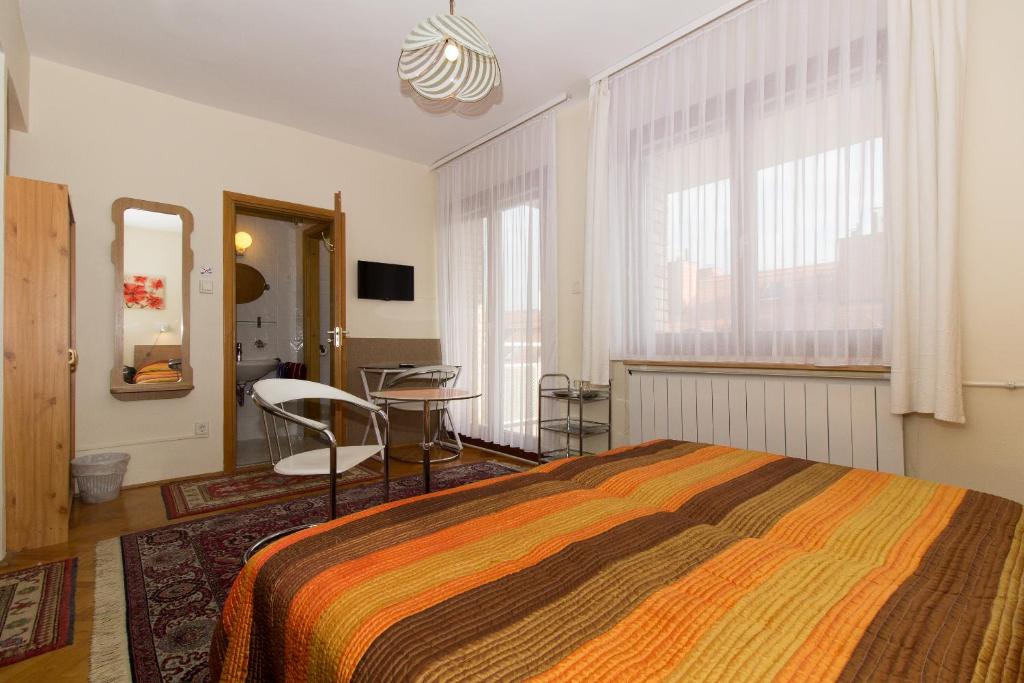 Postel nebo postele na pokoji v ubytování Budavar Bed and Breakfast