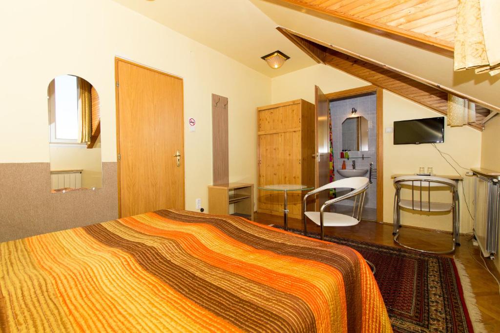 Postel nebo postele na pokoji v ubytování Budavar Bed and Breakfast