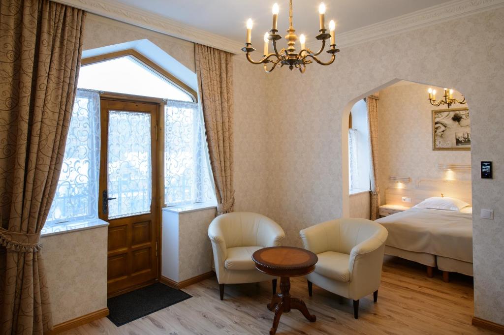 Voodi või voodid majutusasutuse Georgi Hotell toas