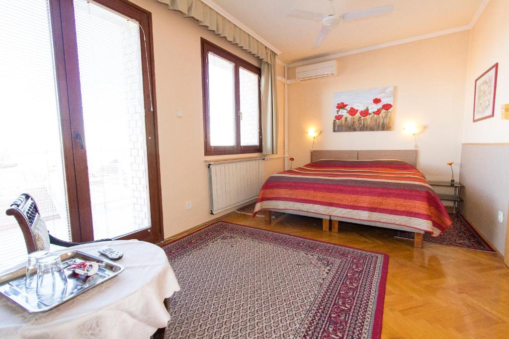 Postel nebo postele na pokoji v ubytování Budavar Bed and Breakfast