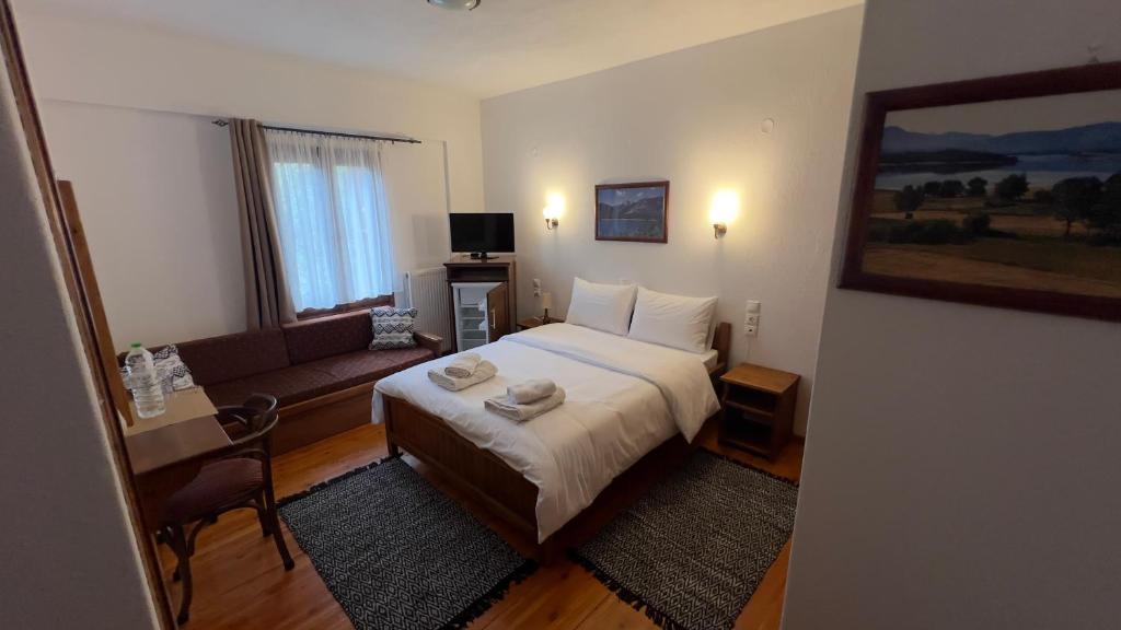 Postel nebo postele na pokoji v ubytování Πασιθεα mountain rooms