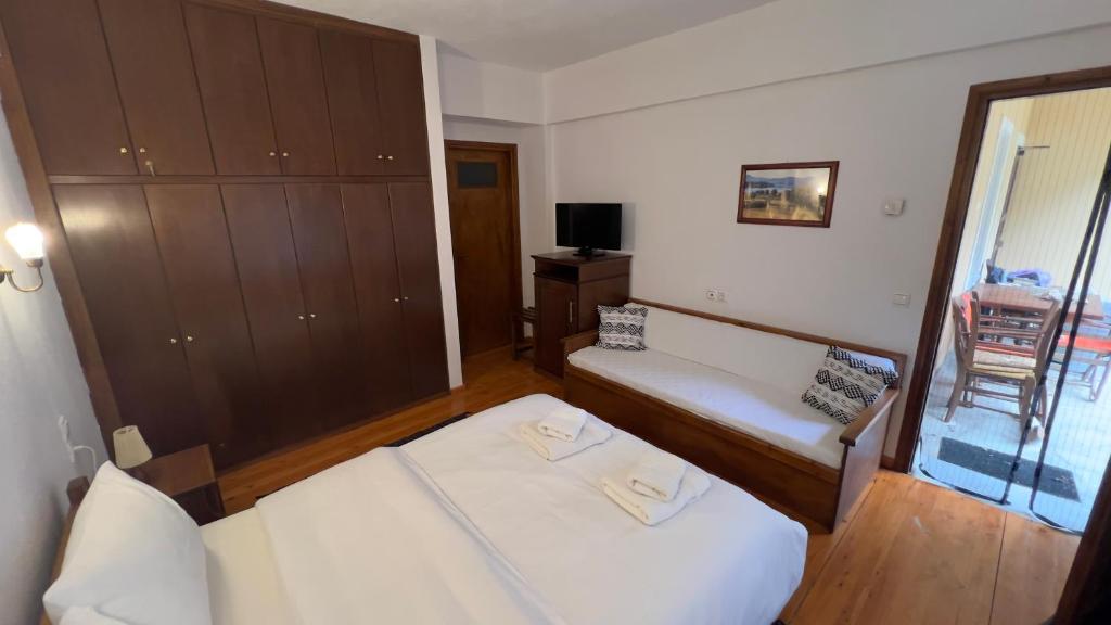 Postel nebo postele na pokoji v ubytování Πασιθεα mountain rooms