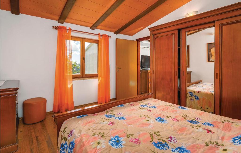 Postel nebo postele na pokoji v ubytování Holiday Home Reburici I