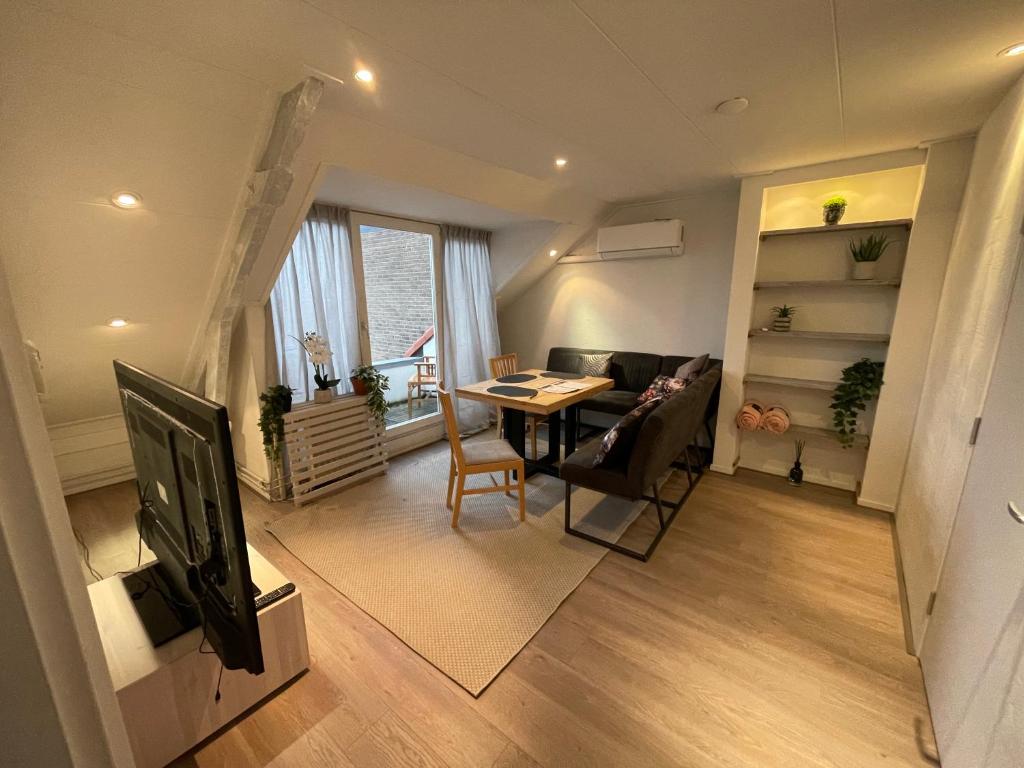 Μια τηλεόραση ή/και κέντρο ψυχαγωγίας στο TopSleep Apartments 24-3