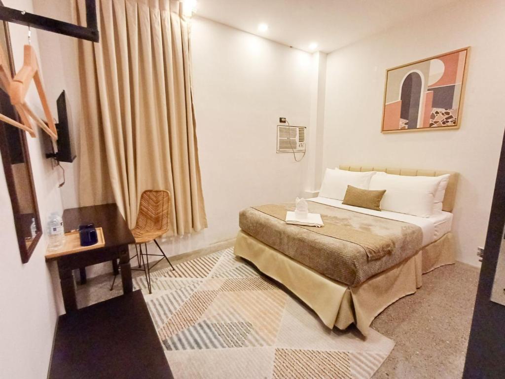 Postel nebo postele na pokoji v ubytování Prince Express Inn