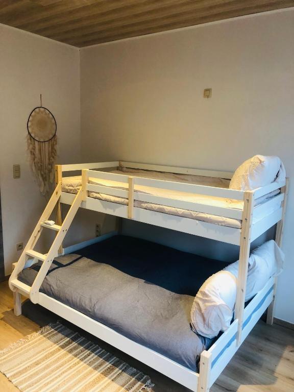 Postel nebo postele na pokoji v ubytování Vakantiewoning De Passerelle