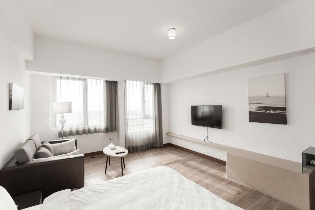 TV a/nebo společenská místnost v ubytování Tien Hsiang Lin Sea Dragon King Hotel