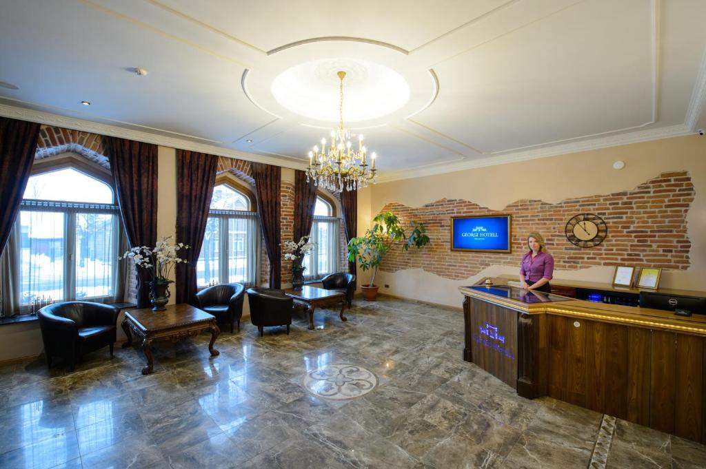 Televiisor ja/või meelelahutuskeskus majutusasutuses Georgi Hotell