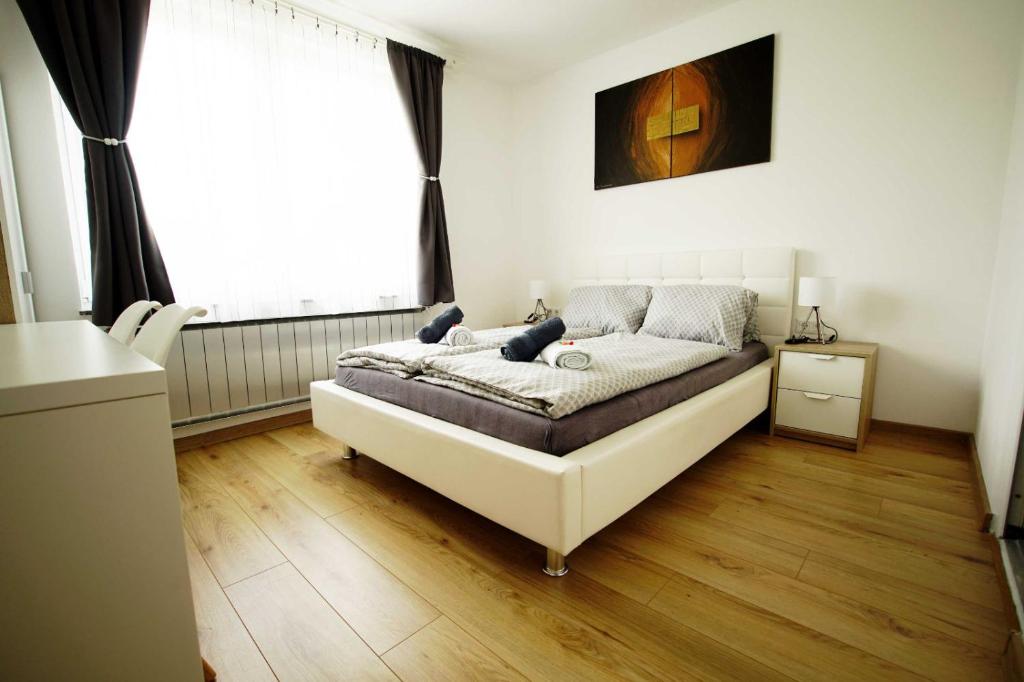 Postel nebo postele na pokoji v ubytování " Haus am Golfplatz" private Unterkunft