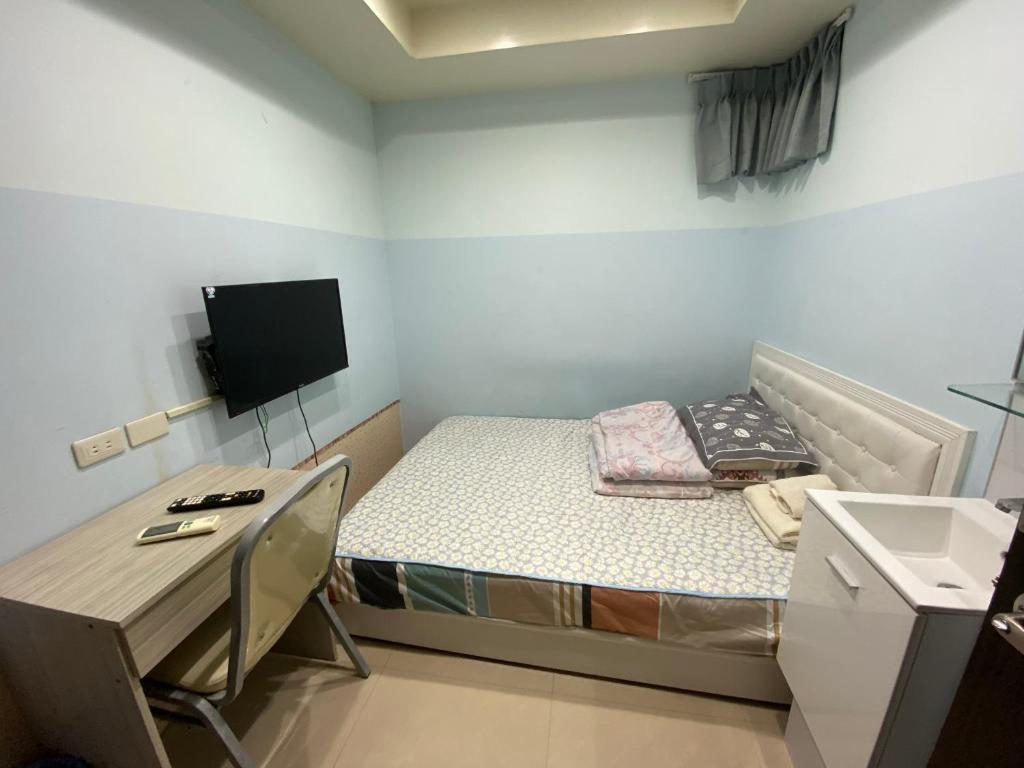 TV a/nebo společenská místnost v ubytování 永春棧Kozzy Apartment