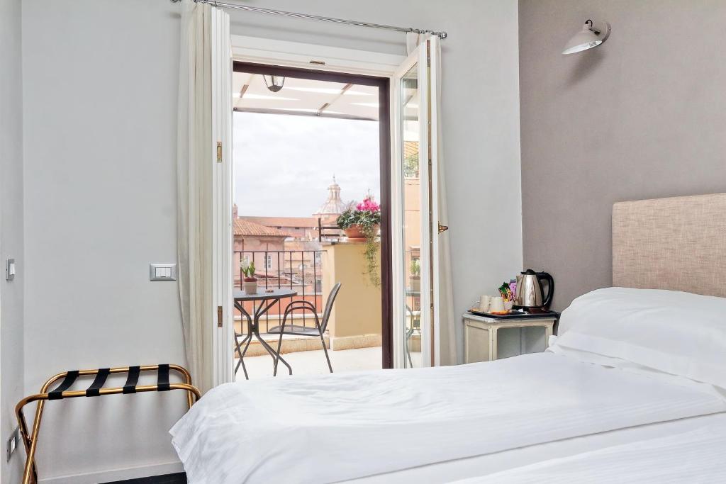 A bed or beds in a room at Cancelleriadieci