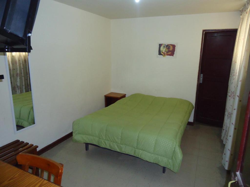 Voodi või voodid majutusasutuse Hotel Estación Central toas