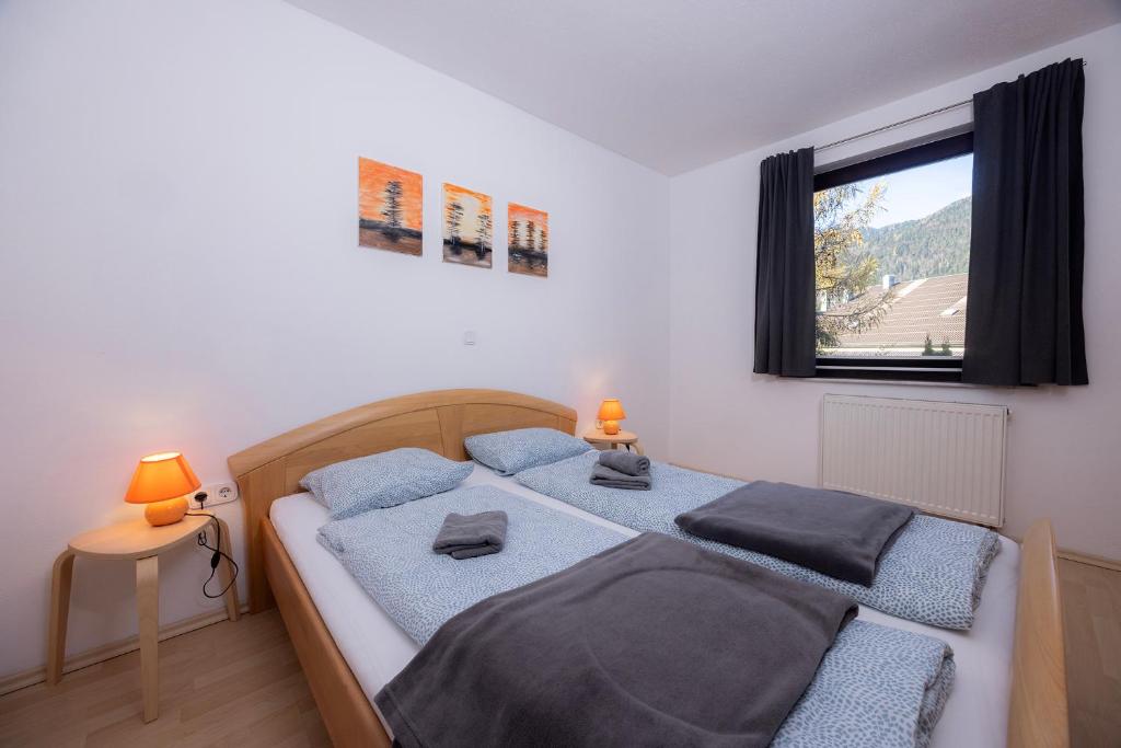 Postel nebo postele na pokoji v ubytování Apartmaji Anže Kranjska Gora